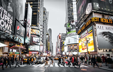 A shot of Times Square in New York City during the day, busy.