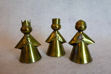 Three metal sculptures of the Kings.