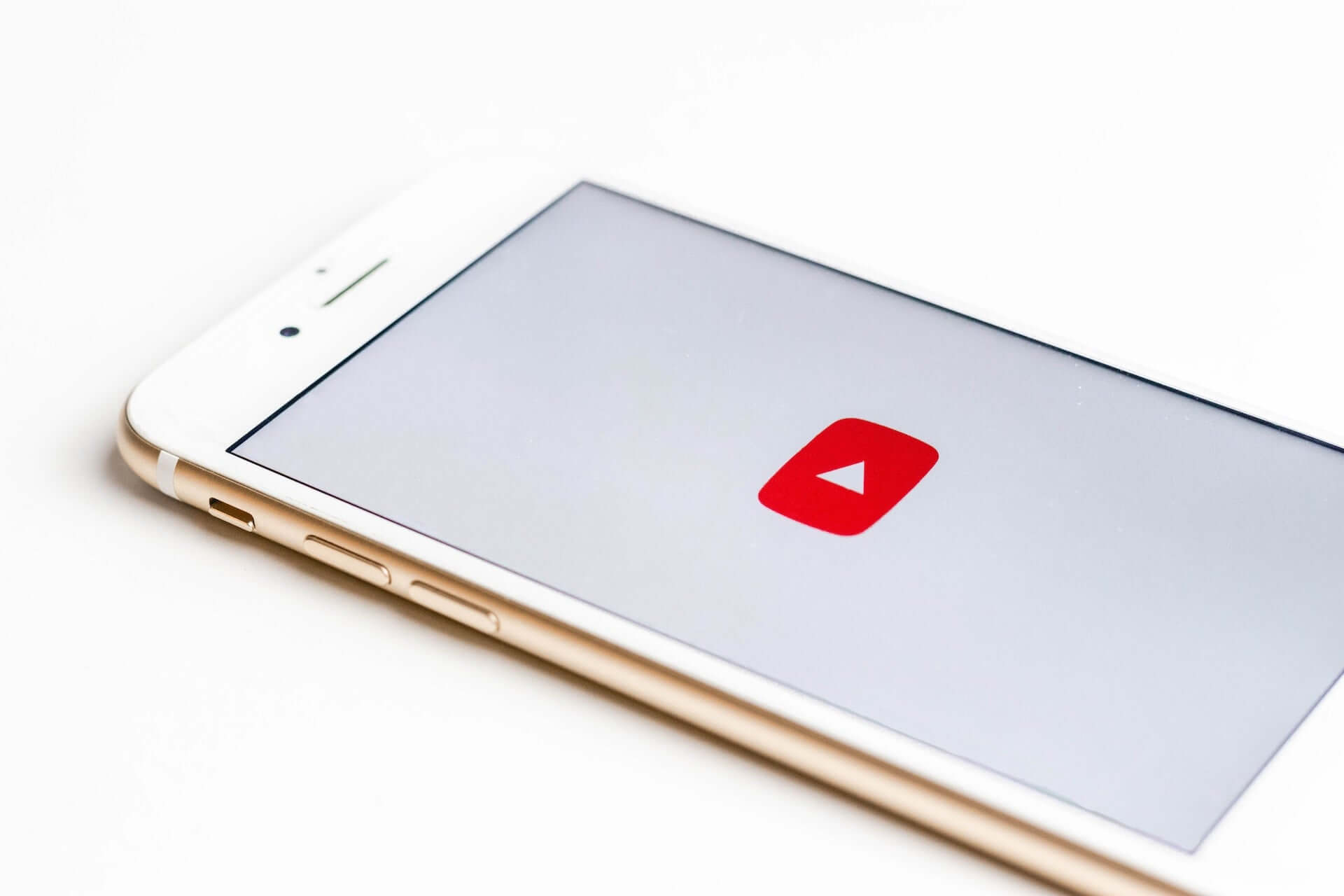 A phone displaying the YouTube logo.