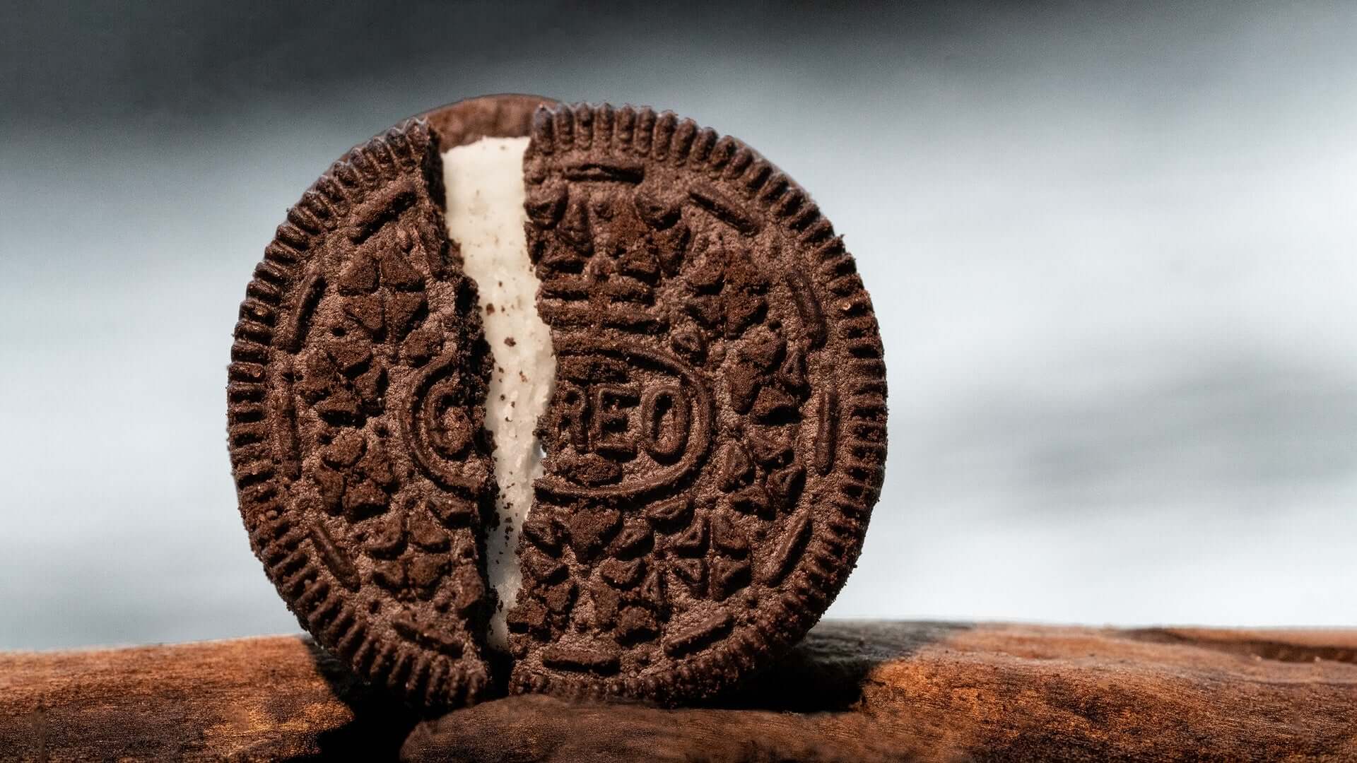 A broken Oreo cookie standing upright.