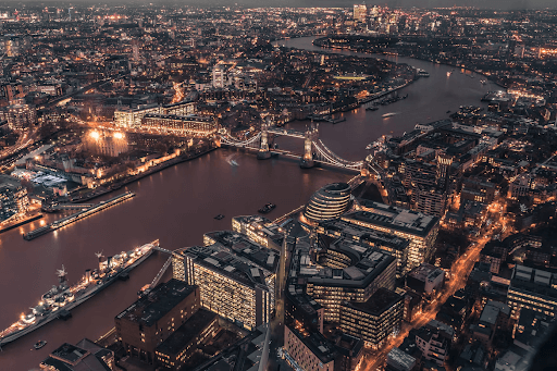 Overhead shot of the Themes River in london at night.