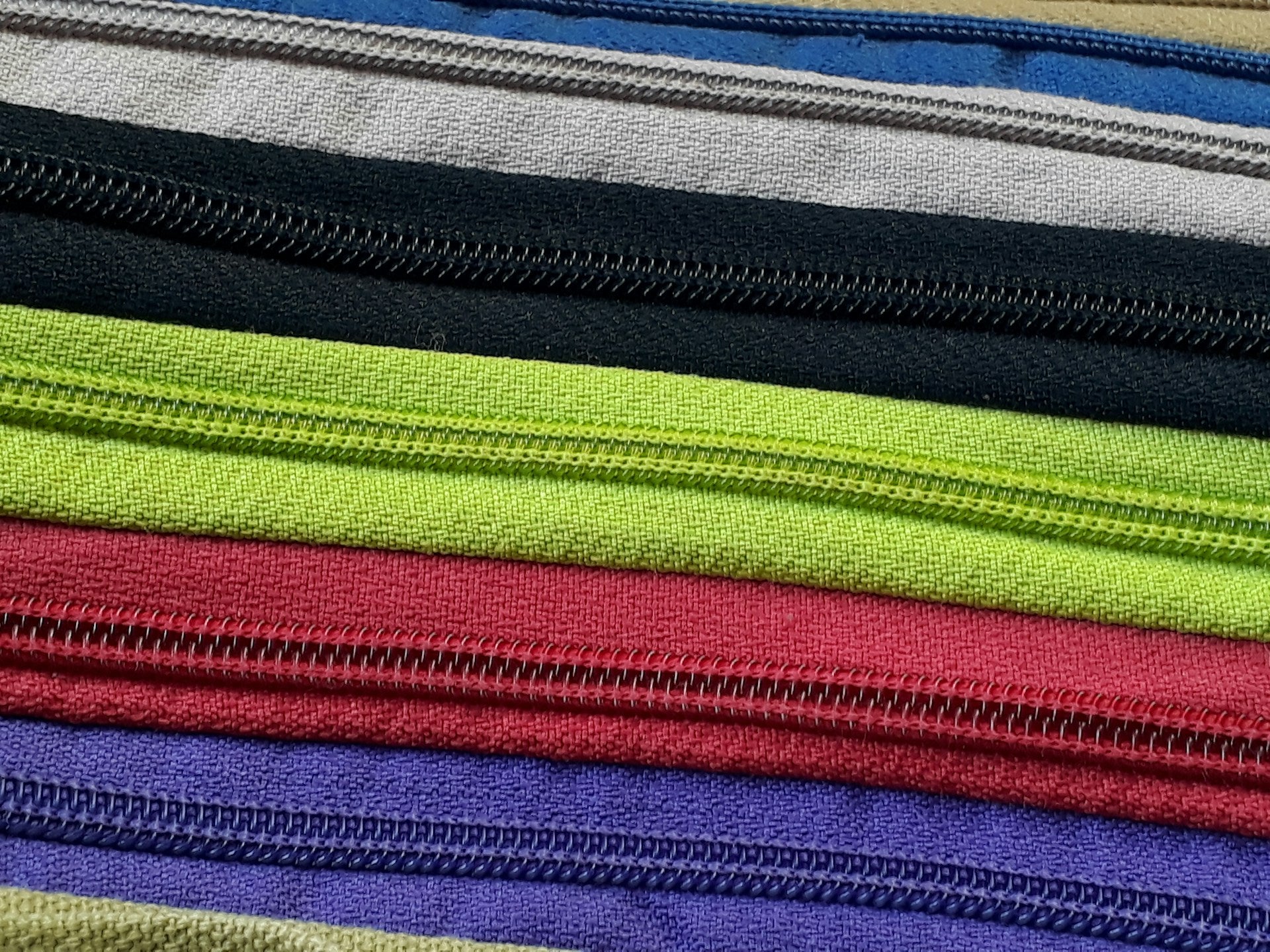 Several zippers in various colors.