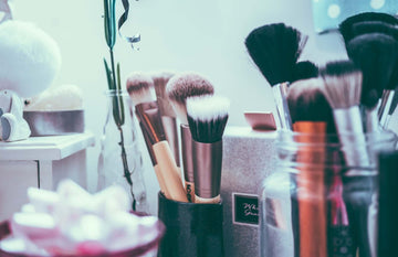 A selection of various makeup brushes and utensils.