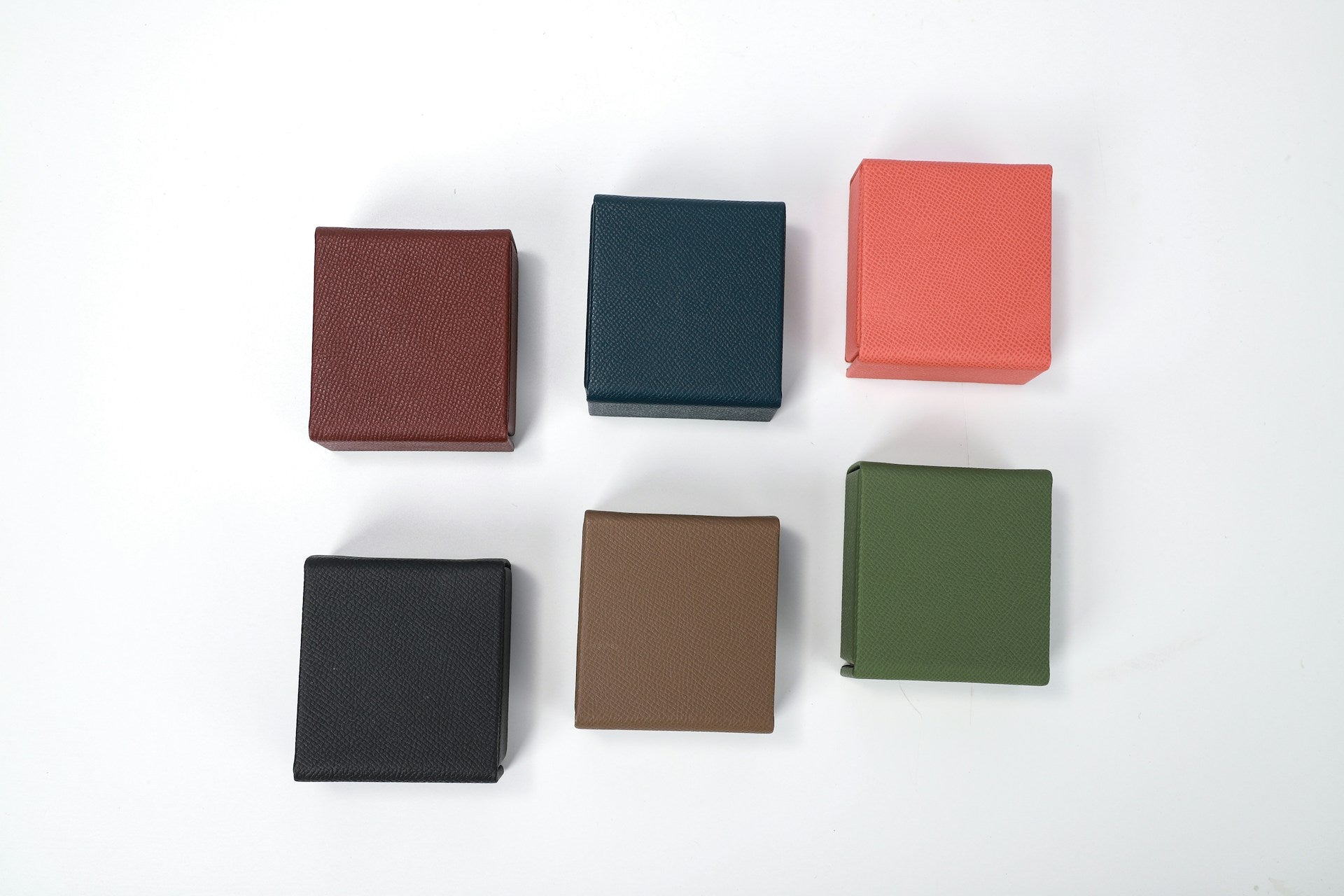 Size boxy wallets in various colors.