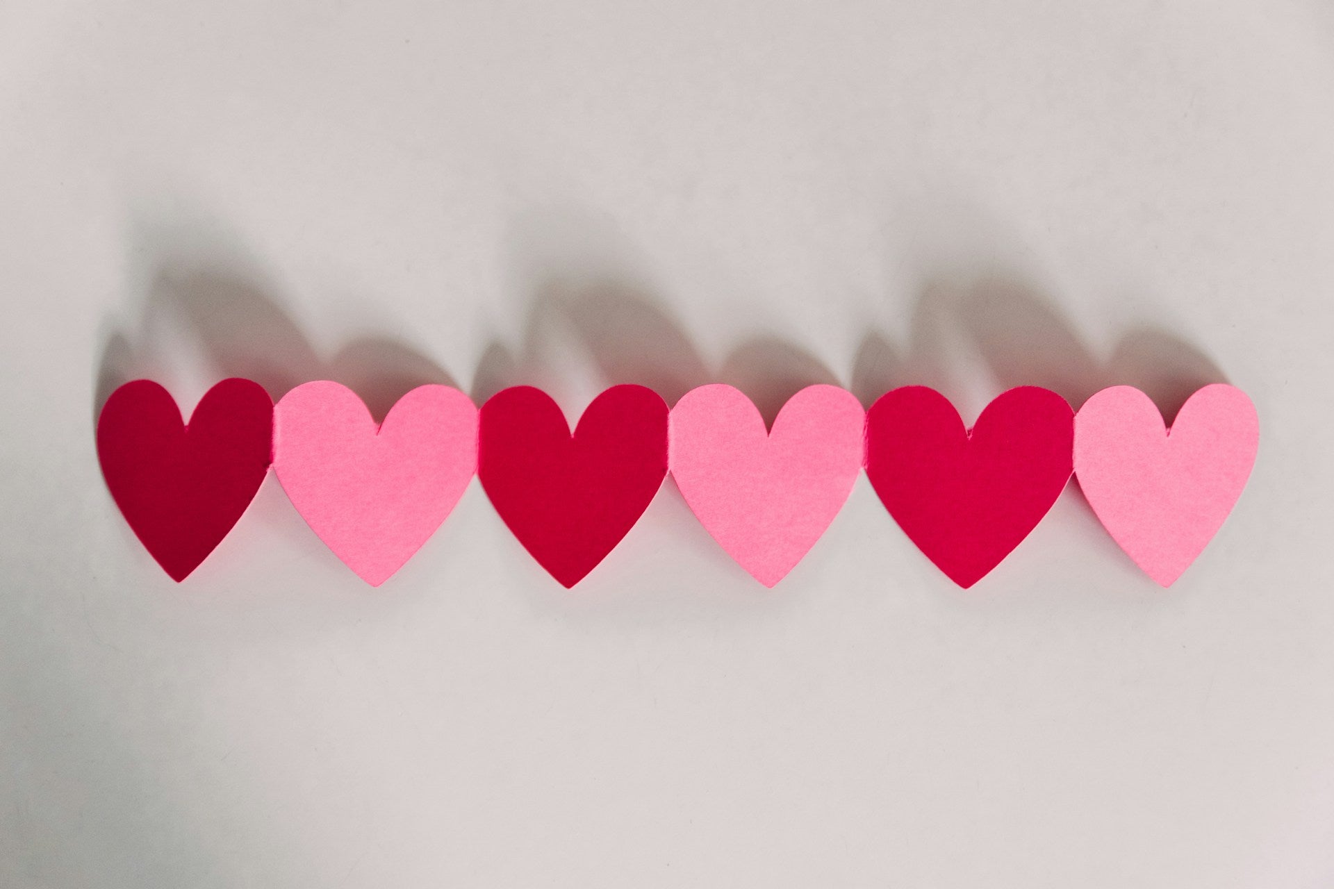 Pink and red paper hearts.