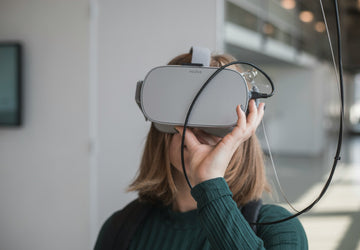 A woman wearing a VR headset.