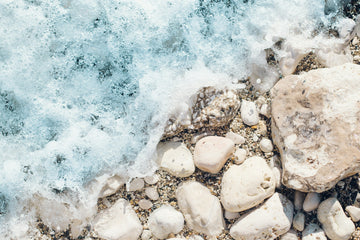 Waves crashing into a rocky beach.