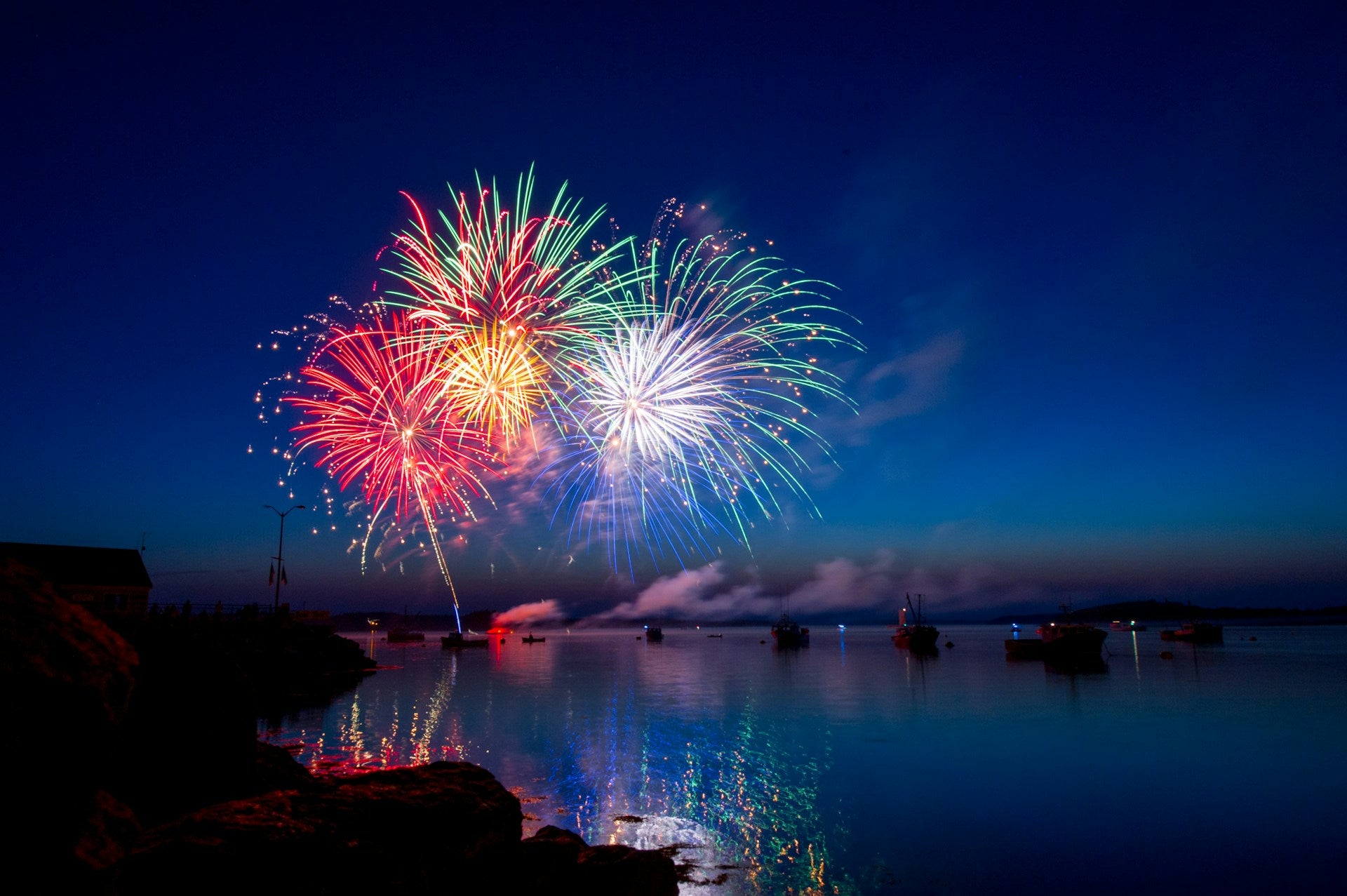 Fireworks over water.