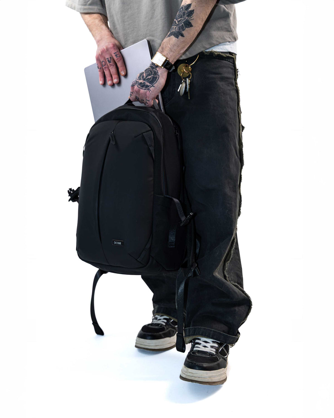 Black vegan backpack on a white background
