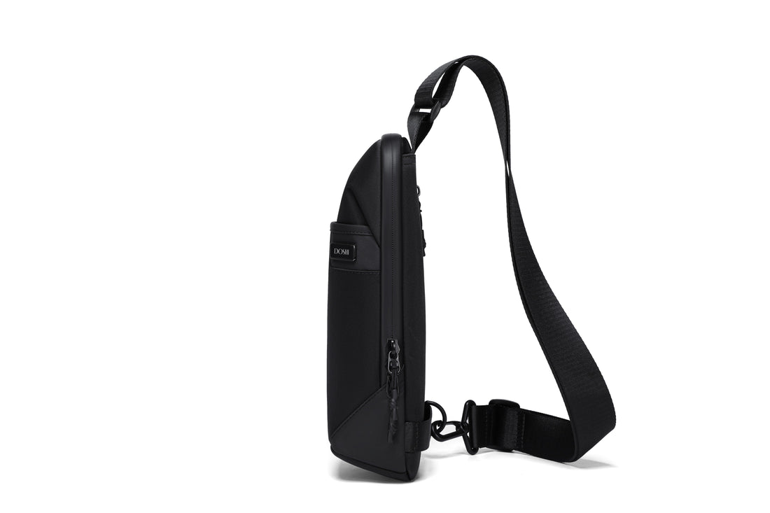 Black sling bag on a white background