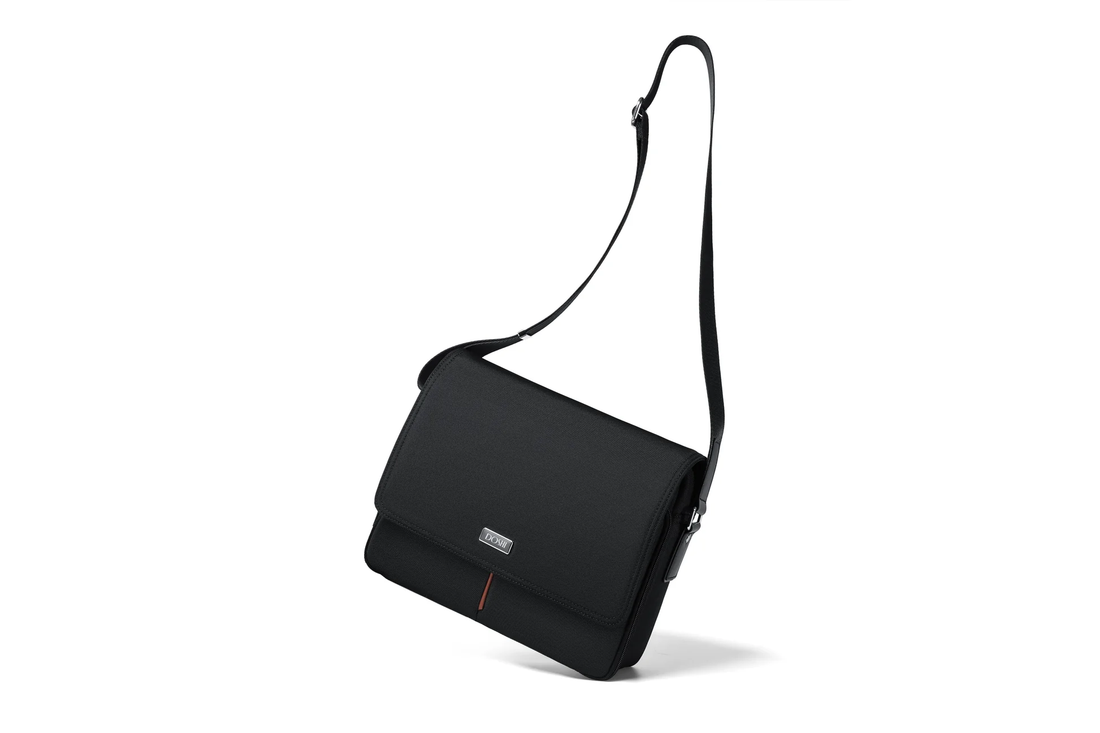 Black vegan leather shoulder bag on a white background